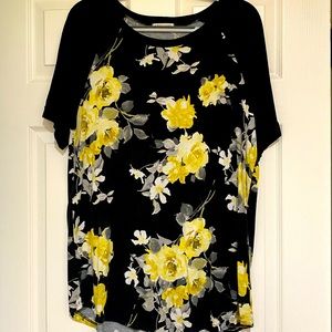 Black top with yellow floral pattern